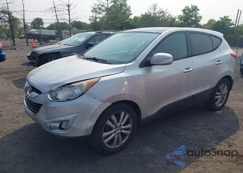2011 Hyundai Tucson Limited z USA, uszkodzony, nr VIN KM8JUCAC1BU140942